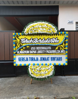 Papan Bunga Duka di Pangkalan Sesai